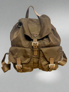Prada Enameled Metal Triangle Backpack