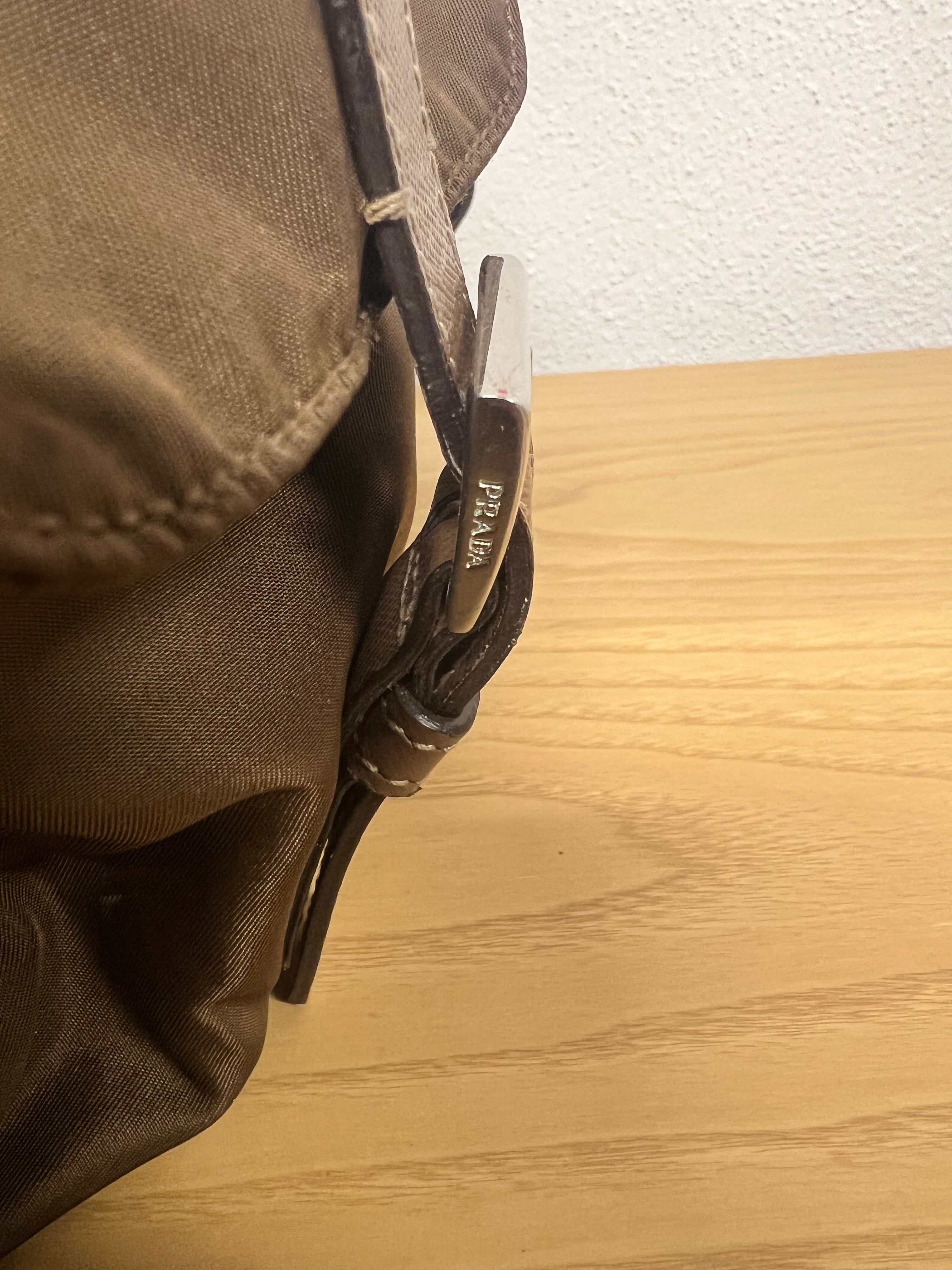 Prada Enameled Metal Triangle Backpack
